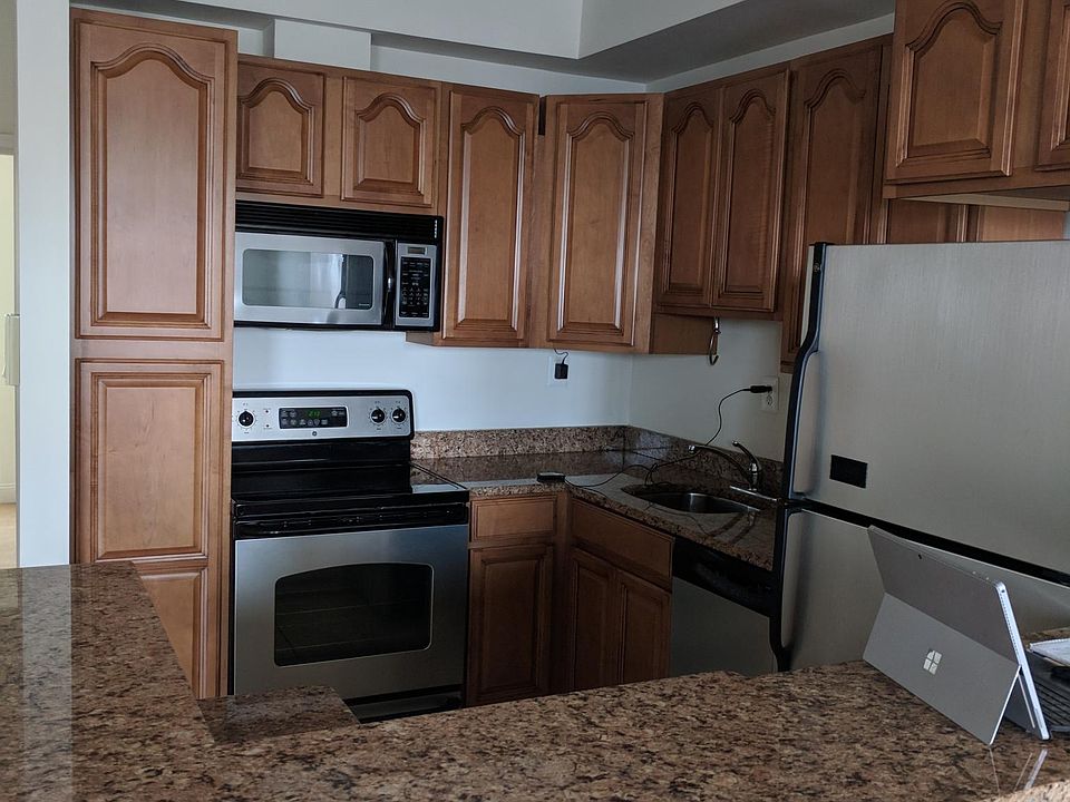 Kitchen stainless steel appliances and Granite top