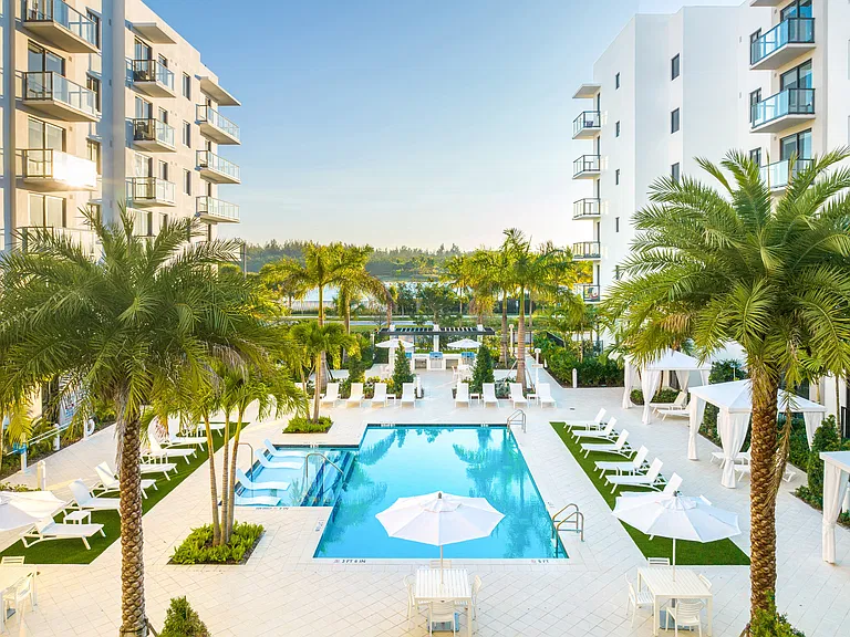 Villa Laguna's lushly landscaped courtyard brings relaxed waterfront atmosphere.
