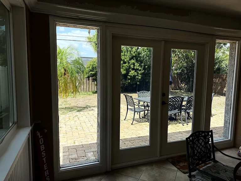 Covered patio with ability to open windows and doors for ocean breezes,