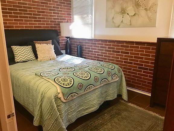 Representational bedroom as decorated by previous tenant