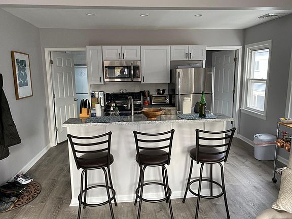 Kitchen that opens up to living room