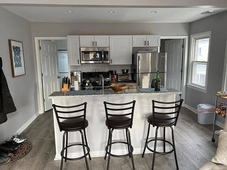 Kitchen that opens up to living room