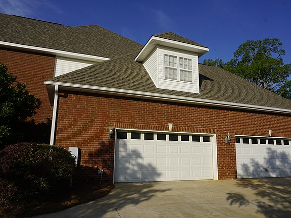 4 car garage with shop area