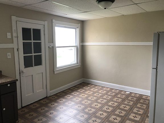 eat-in kitchen with back yard access