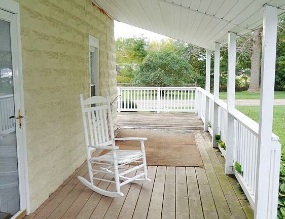 Front covered wrap around porch.