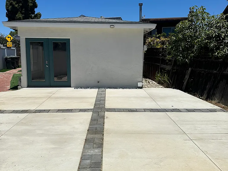 Storage Shed Looking Towards Patio and French Doors