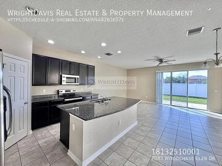 7083 Woodchase Glen Dr — Photo 6