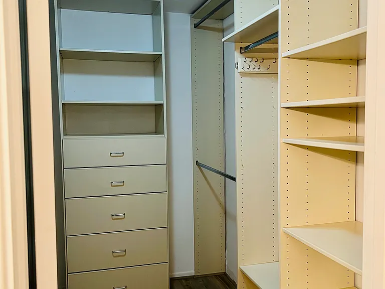 Primary walk in closet has lots of options for your clothing, etc.