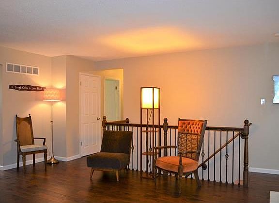 Lots of seating in this room! Convenient access to downstairs!