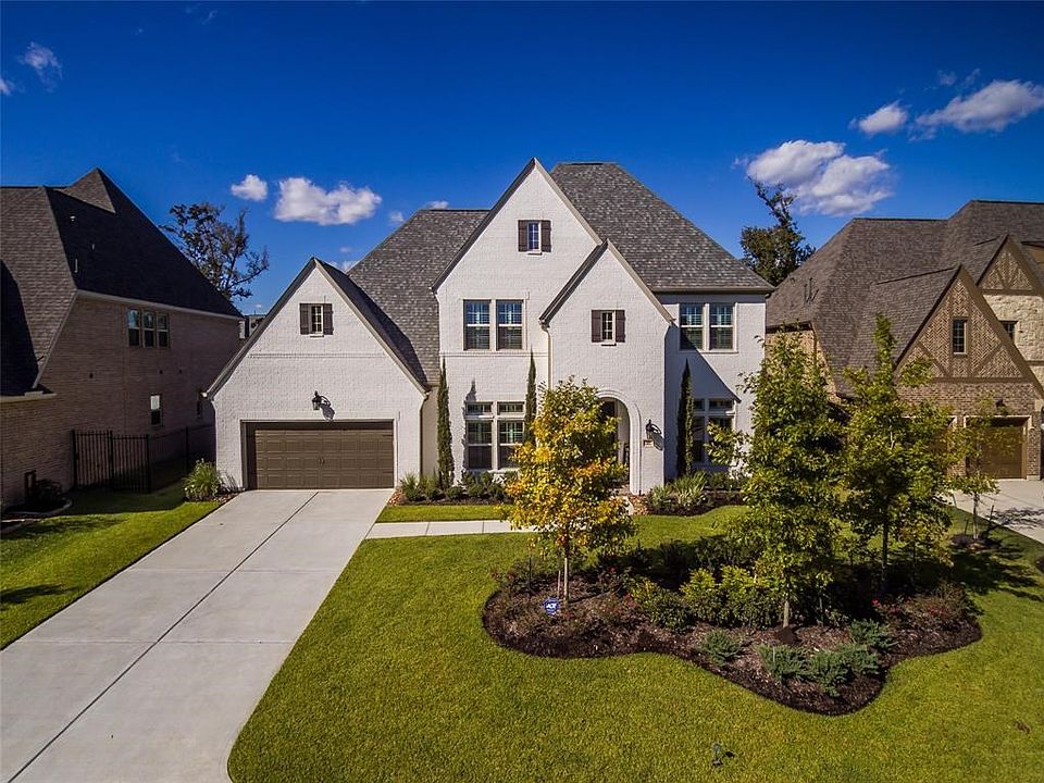 Eye catching landscape lighting added to accentuate the focal points of the front of the home.