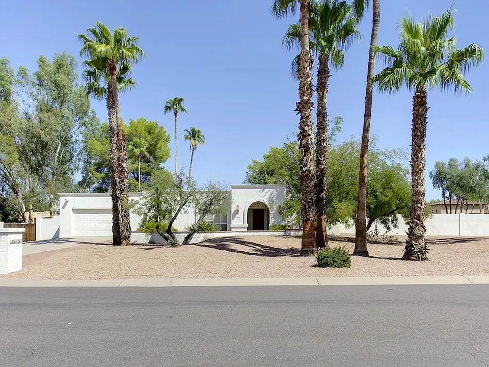 Home sits on a cul-de-sac with only one other home. Parking on the gravel to the left of driveway, if needed, for an RV or extra car.