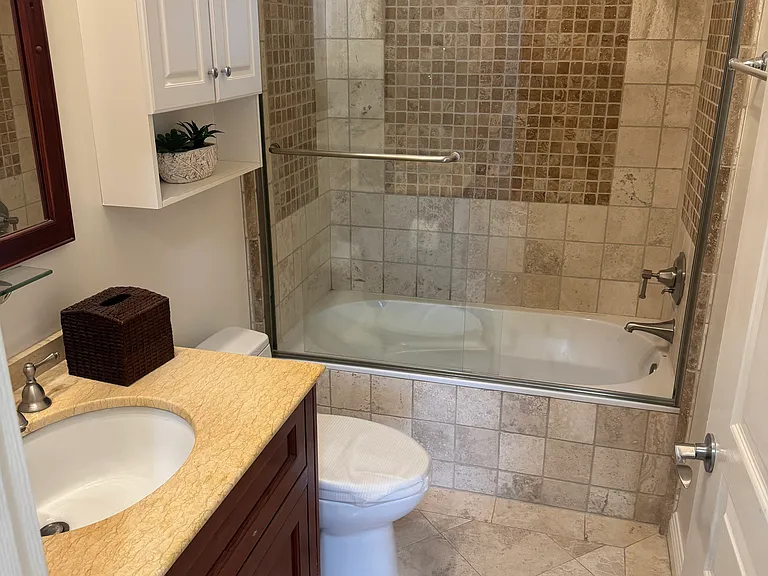 Upstairs bathroom with tub shower