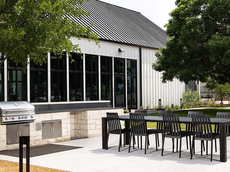Host a barbecue or dine al fresco in our outdoor dining area, featuring convenient grills and comfortable seating.