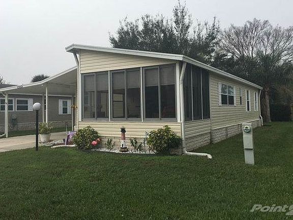 View of Sunporch and carport.
