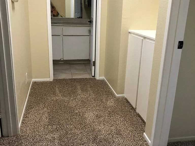 Wide hallways with new carpet