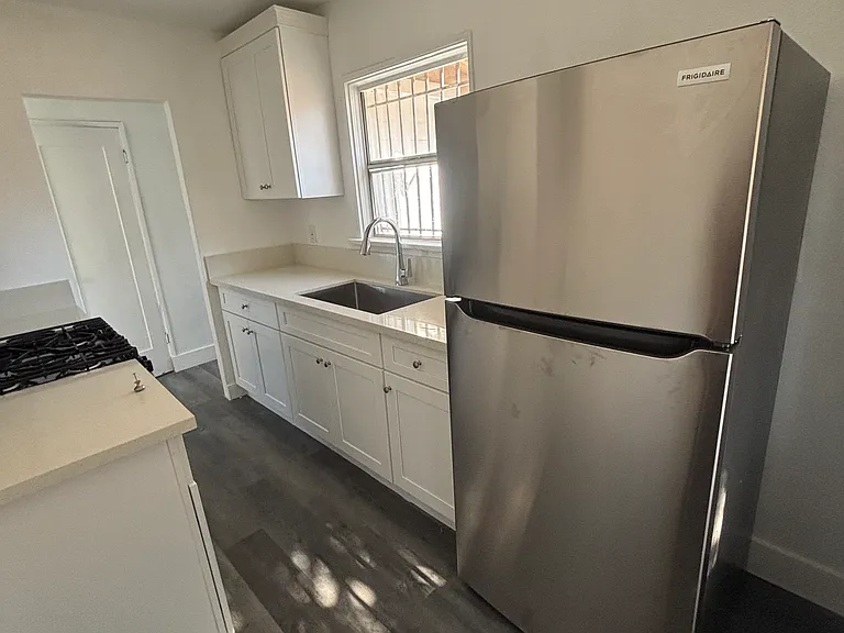 KITCHEN VIEW FACING HALLWAY