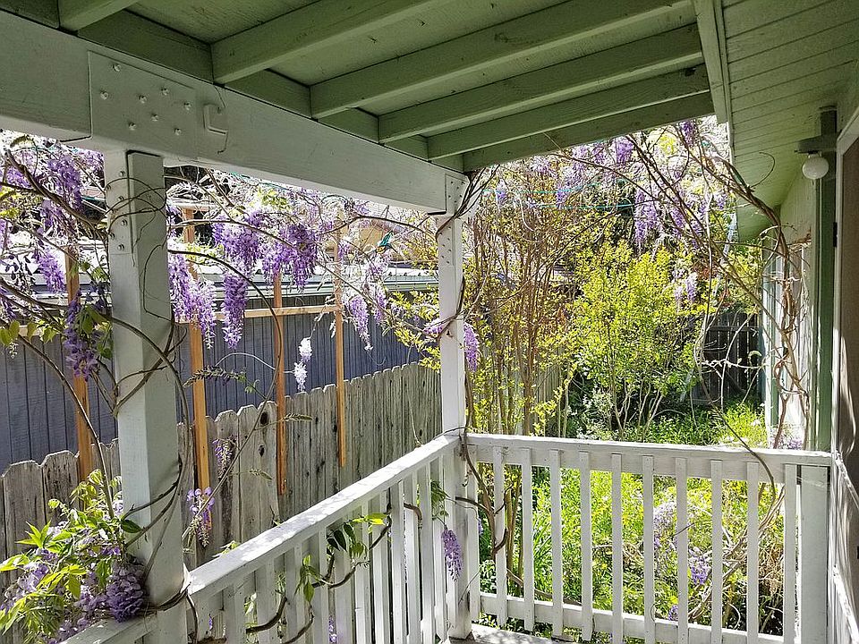 Front porch with wisteria