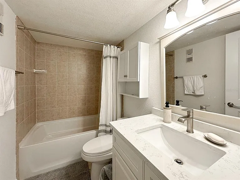 7920 Sun Island Dr S #102 — Photo 24