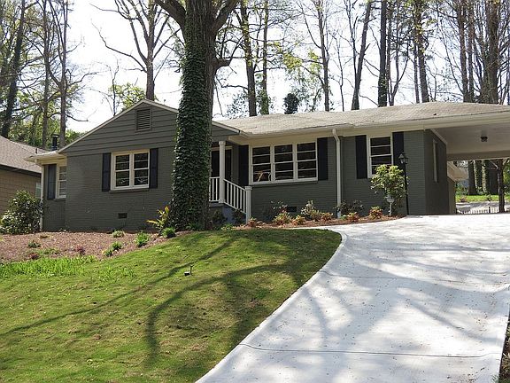 Notice the WIDE Driveway