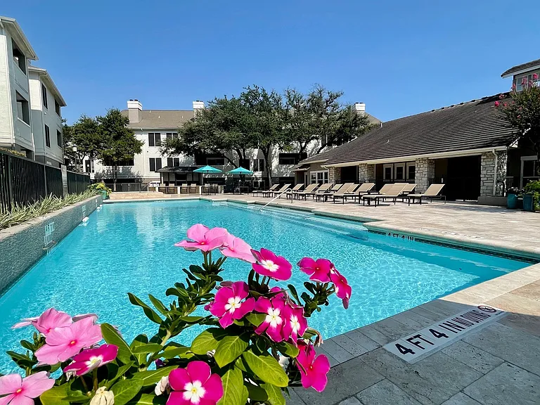 Enjoy sunny days lounging by the pool