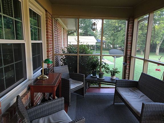 Screened porch near pond