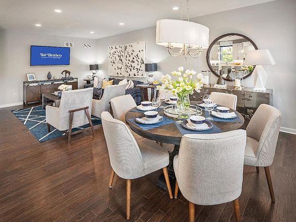 The great room in the Lynford II affords space for relaxing and dining