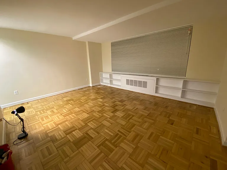 Looking towards the window with your back to the closet door. (Kitchen is to the left.