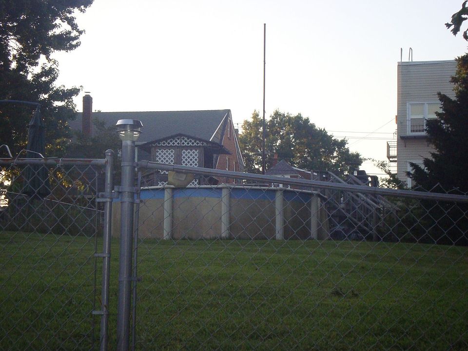Fenced in yard with Pool and Deck