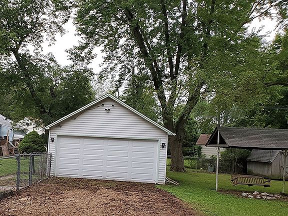 Garage and swing for two