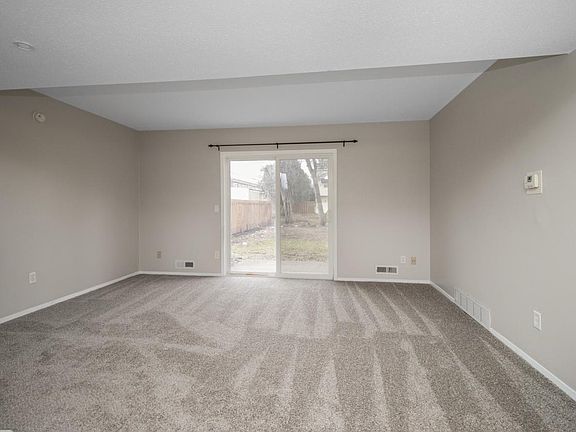 Living room with sliding glass door.