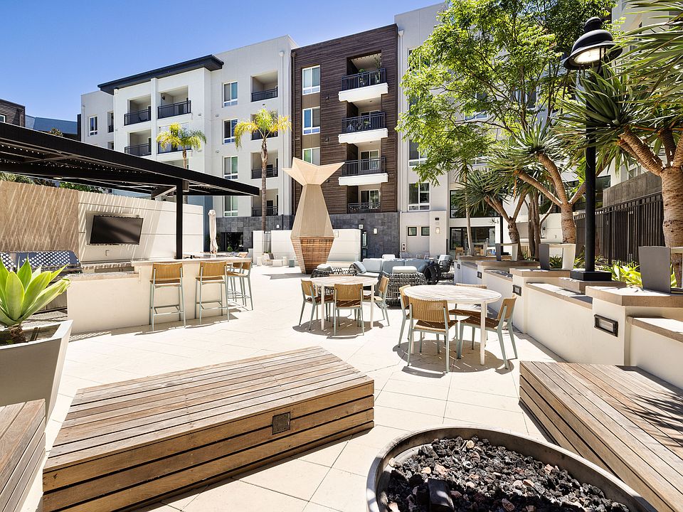 Outdoor Seating Area and Pool Deck | Elan Huntington Beach | Apartments in Huntington Beach, CA
