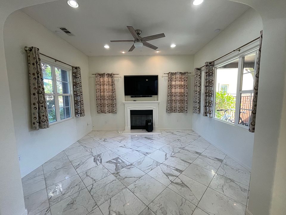 Living room with 55" flat screen TV and sound bar