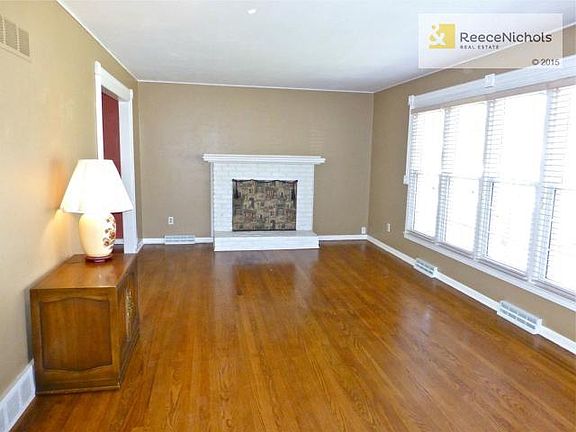 Gleaming hardwood floors throughout home. Fresh paint too.