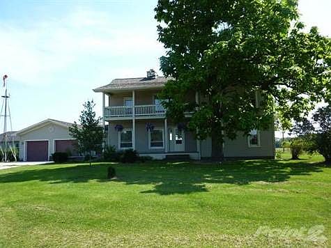 Spacious 4 bedroom, 2 bath farmhouse on 5 acres.