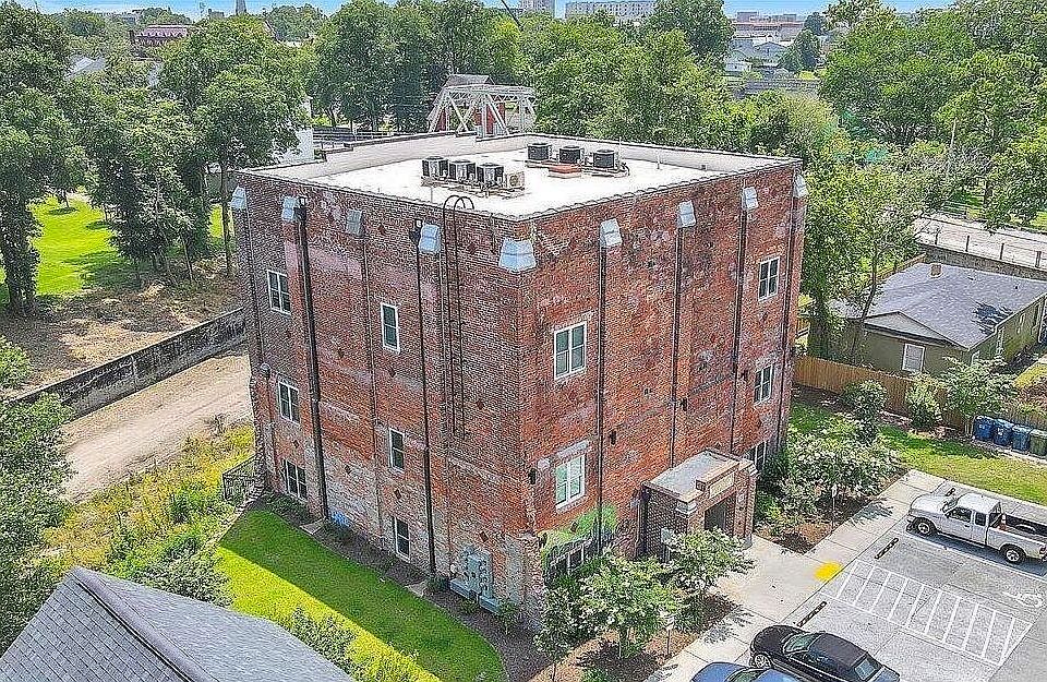 Unit is located on first (ground) floor on left side of building