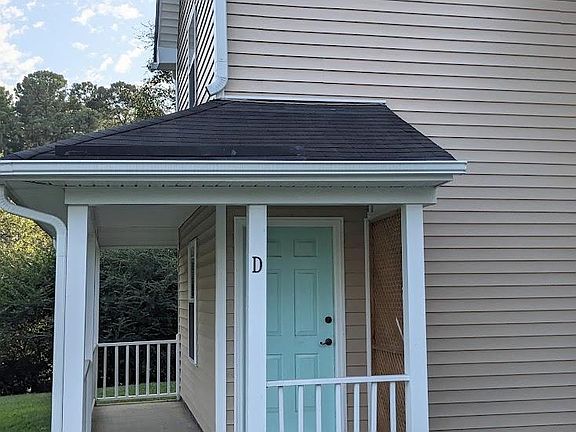 End unit with a front porch to enjoy