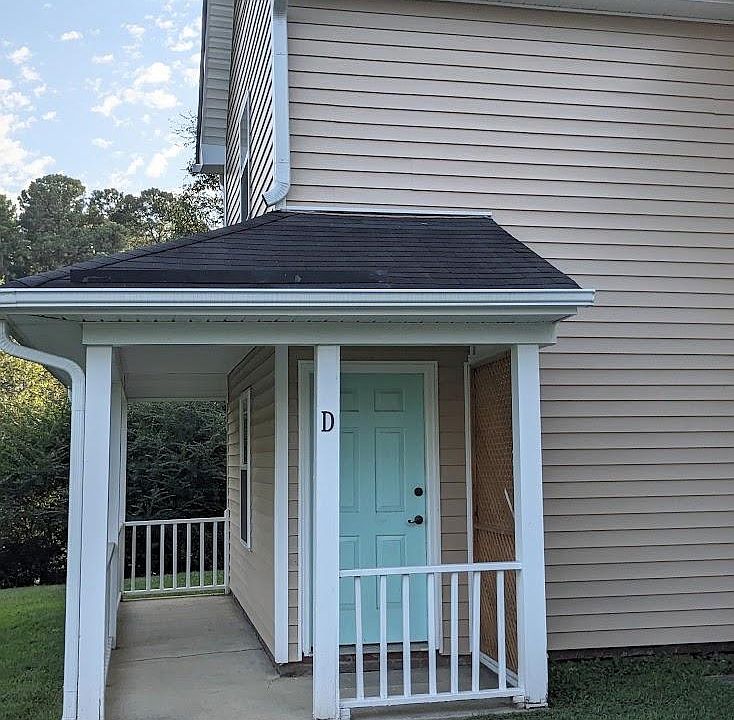 End unit with a front porch to enjoy