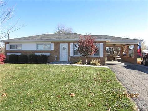 Ranch - no steps.  Low maintenance brick exterior.  Level driveway - so easy to navigate in the winter.  Attached carport can also function as a covered porch.  Additional parking pad to right of driveway.