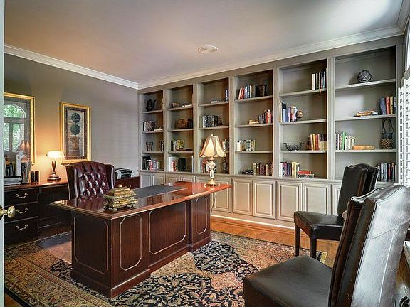 Details Make a Difference. Office w/ Wall of Built0Ins