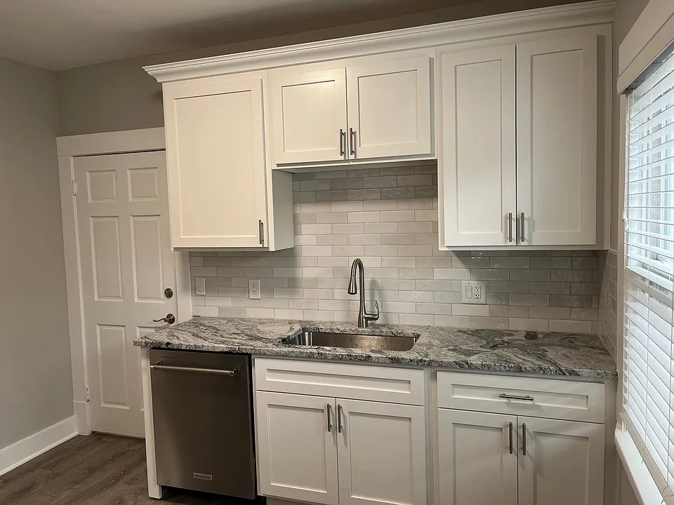 Kitchen: Custom shaker cabinets and dishwasher