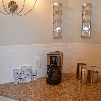 coffee / wine bar area with cabinet below.