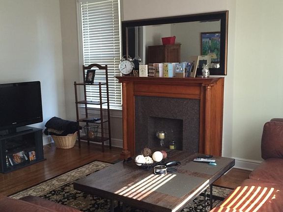Living room w decorative fireplace