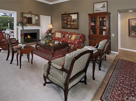 Living Room opens to Dining Room and Patio for Easy Entertaining