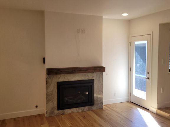 Gas fireplace with access to rear yard