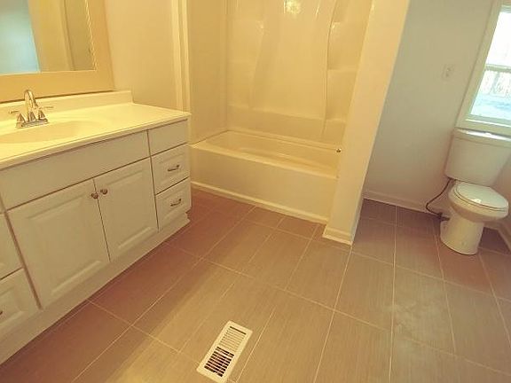 New, huge master bathroom. new shower, tub, vanity, toilet, floor - really lovely