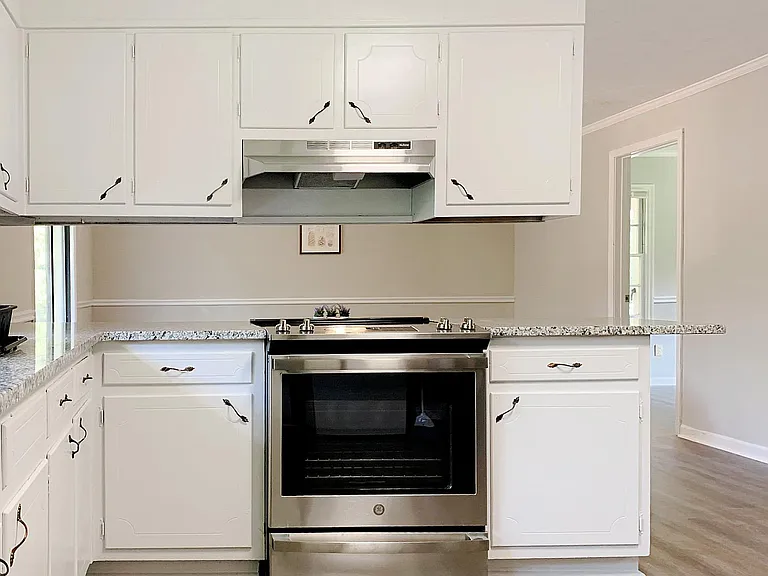 Renovated Kitchen with stainless steel appliances and granite counters