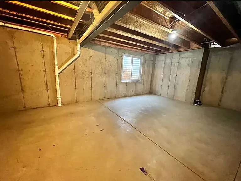 View of the basement beneath the master bedroom, closet and bathroom.