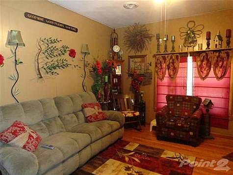 Living room with double windows facing the West.