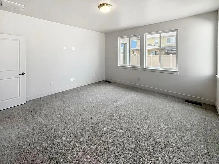 Primary bedroom with generous natural light