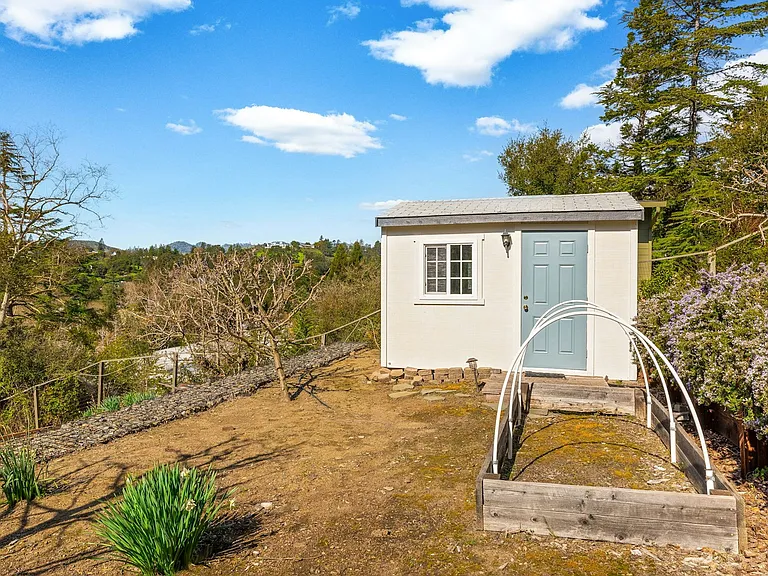 Bonus backyard potential this versatile shed offers the perfect spot for a workshop, garden studio, or extra storage, all surrounded by peaceful hillside views.